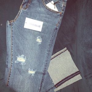 Destroyed skinny jeans w/ adjustable fold length
